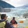People kayaking by Mendenhall Glacier, icebergs and mountains